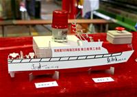 圖說：雙方主持人關務署高雄關蘇淑貞關務長、台船公司高建一副總經理示意簽名留念